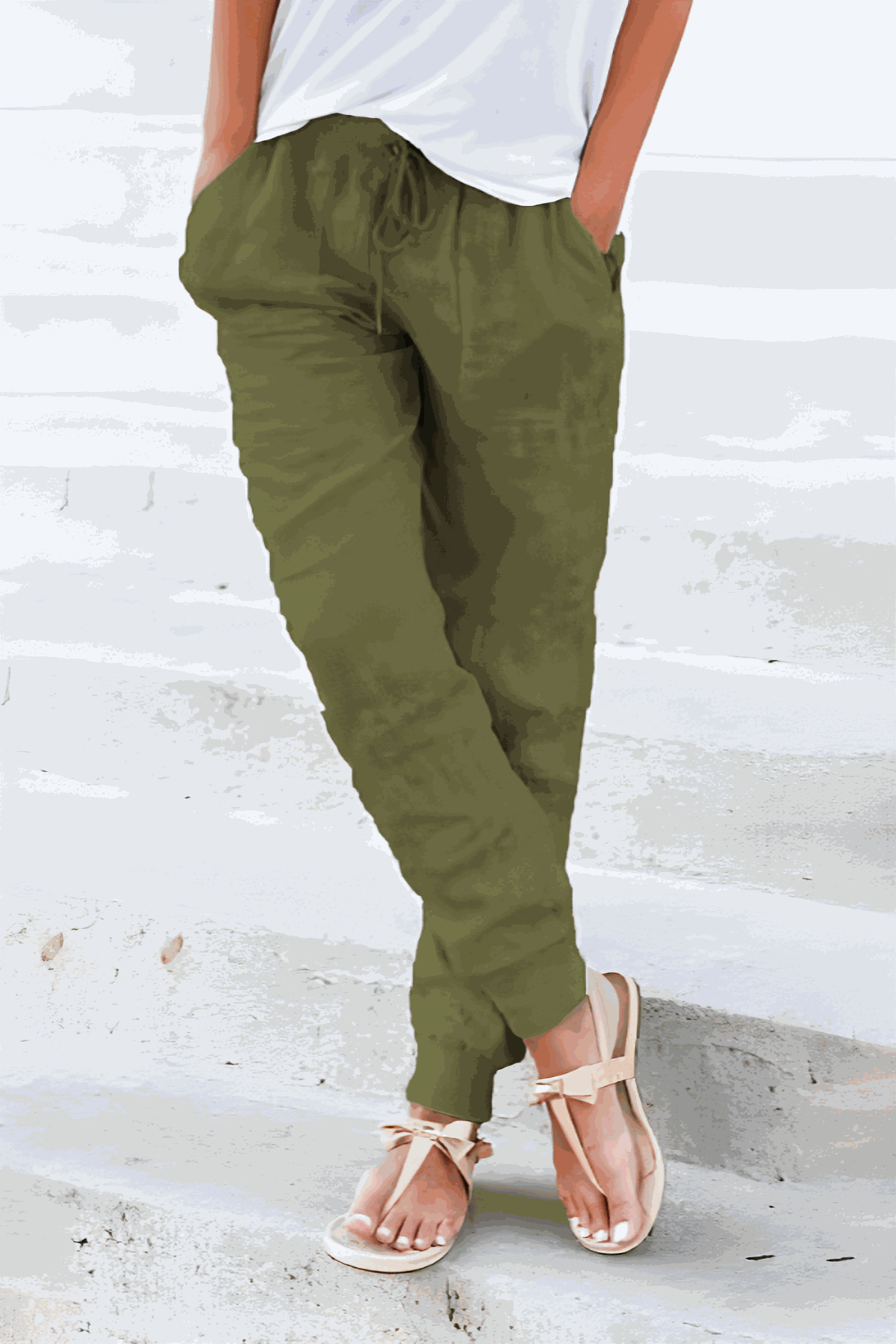 Tan women's tapered jogger pants with drawstring waist and elasticated ankle cuffs