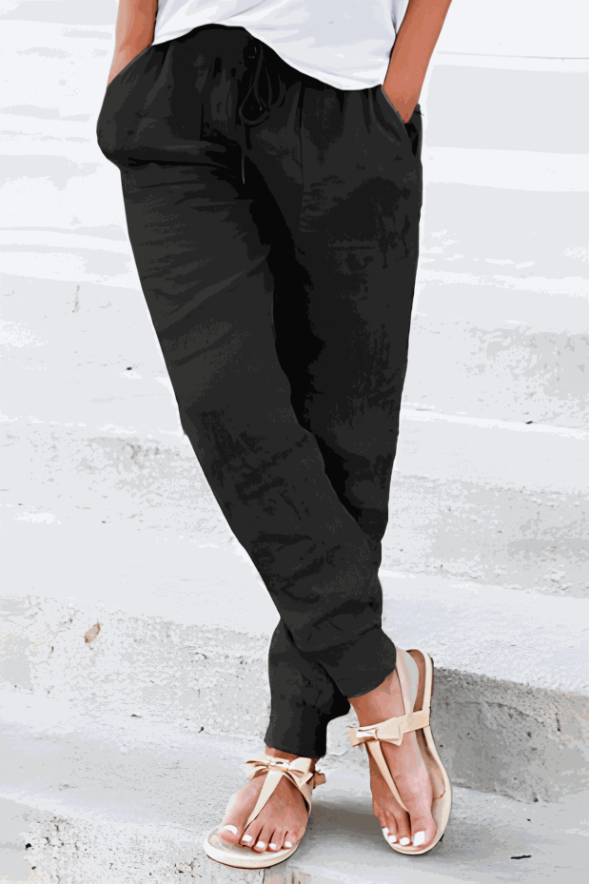 Women's tan tapered jogger pants with drawstring waist and elasticated ankle cuffs