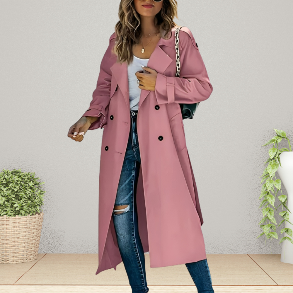 Women's beige double-breasted longline trench coat with classic tailoring and symmetrical button front