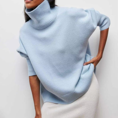 Bright pink unisex turtleneck knit sweater with cozy relaxed fit in 70% Merino wool blend