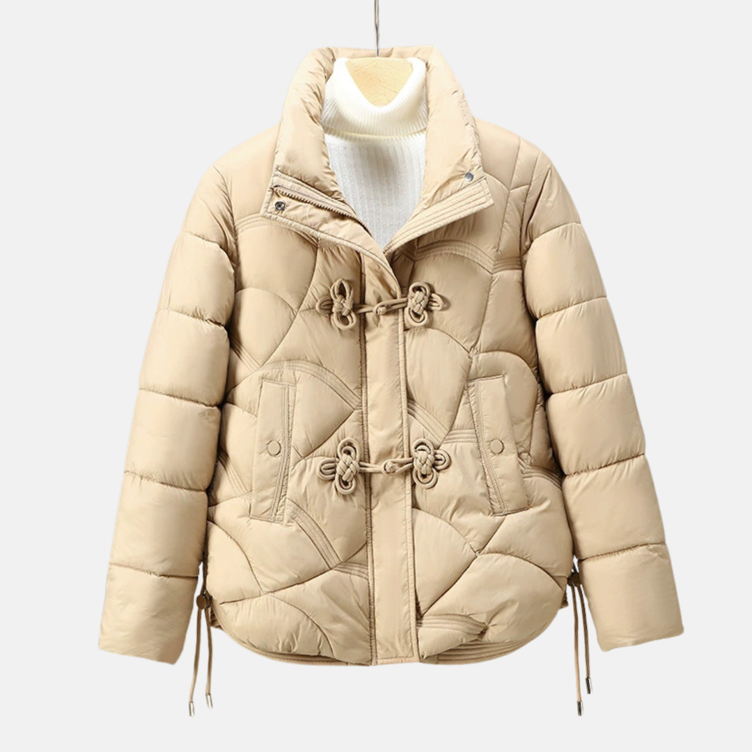 Women's geometric quilted puffer jacket with frog button closure and adjustable hem for a flattering fit
