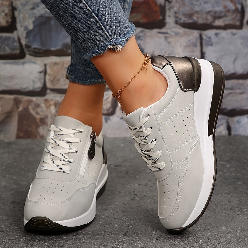 Scarlett™ women's white comfort sneaker with ergonomic sole and elegant low-top design