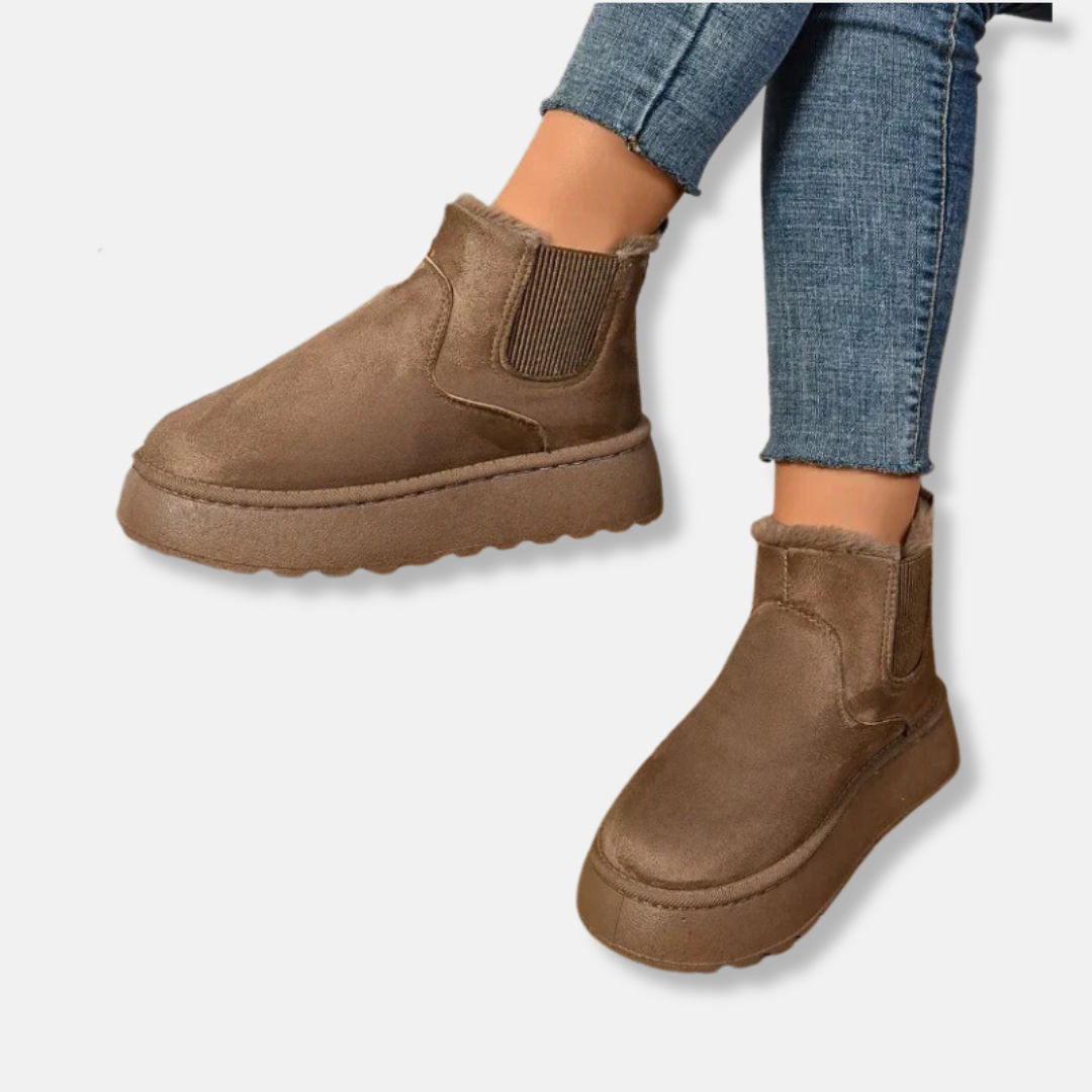 Women's black synthetic suede slip-on ankle boots with chunky platform sole for elevated everyday style