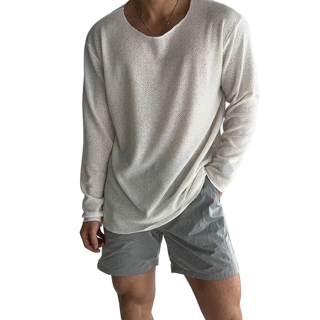 Cream relaxed-fit knit long sleeve top with round neck and lightweight loose drape
