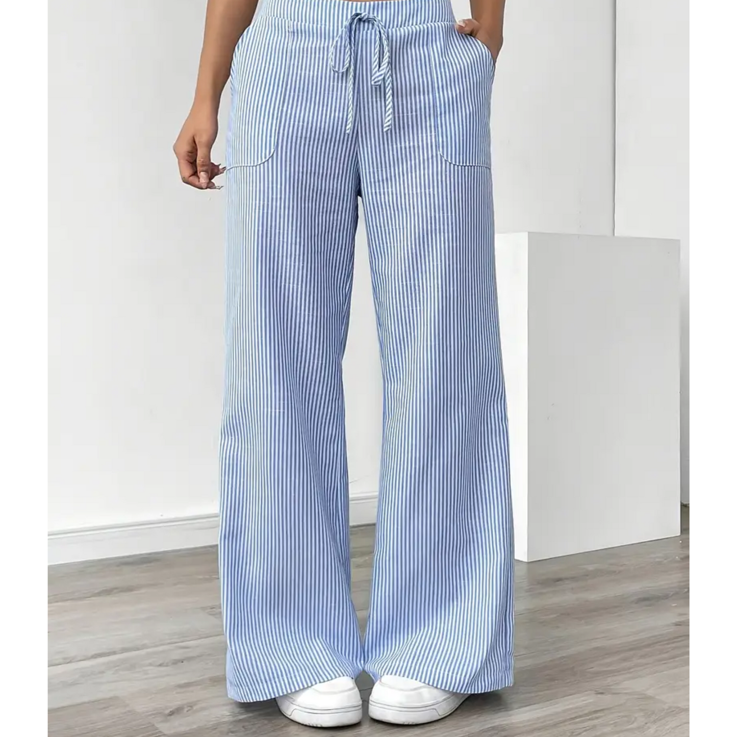 Striped wide-leg pants with adjustable waistband, vertical stripe pattern and side pockets