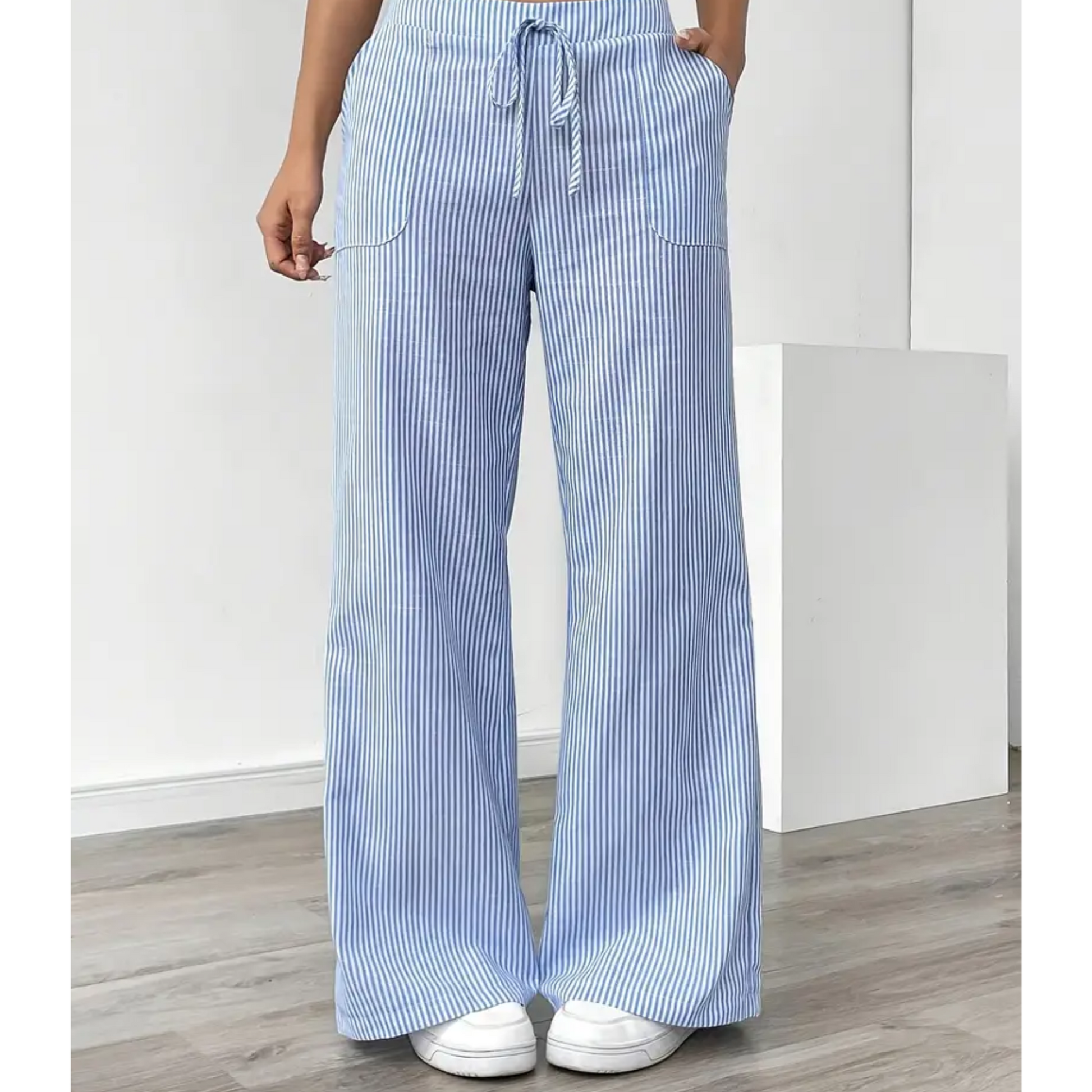 Striped wide-leg pants with adjustable waistband, vertical stripe pattern and side pockets
