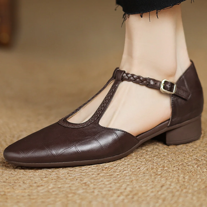 Women's black leather pointed toe Mary Jane flats with slim braided T-strap and cushioned sole