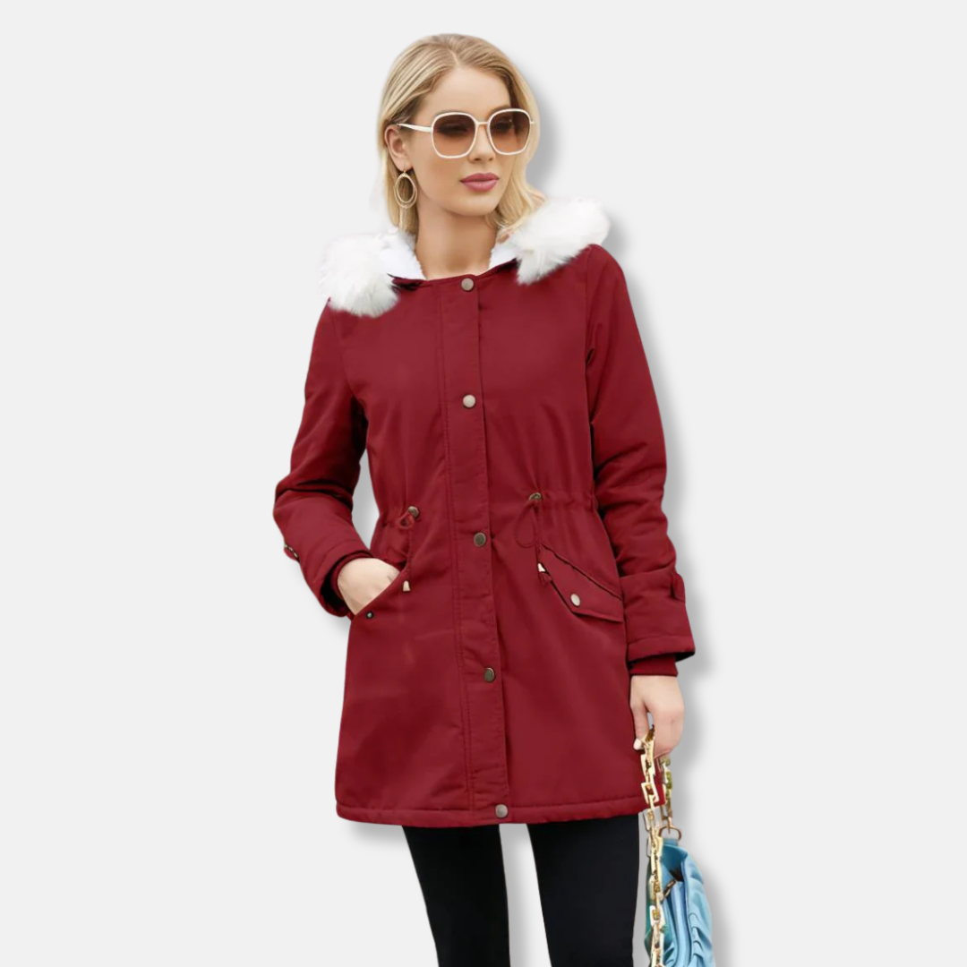 Women's mid-thigh parka coat with detachable faux fur trim, smooth woven exterior, relaxed chic fit