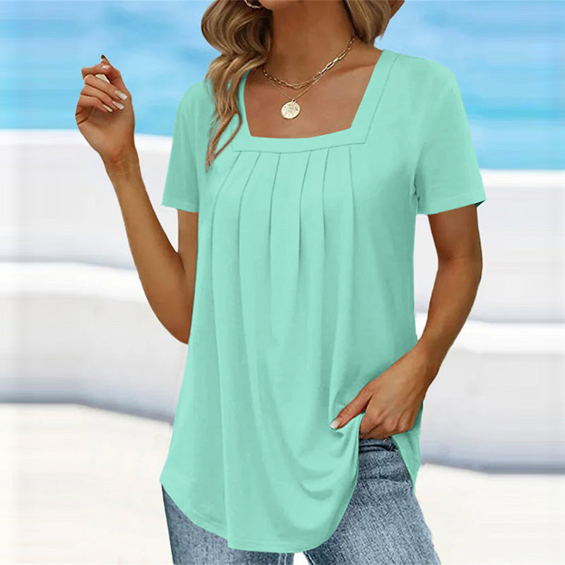 Elegant pleated blouse with soft front pleats, timeless chic style for work or casual wear