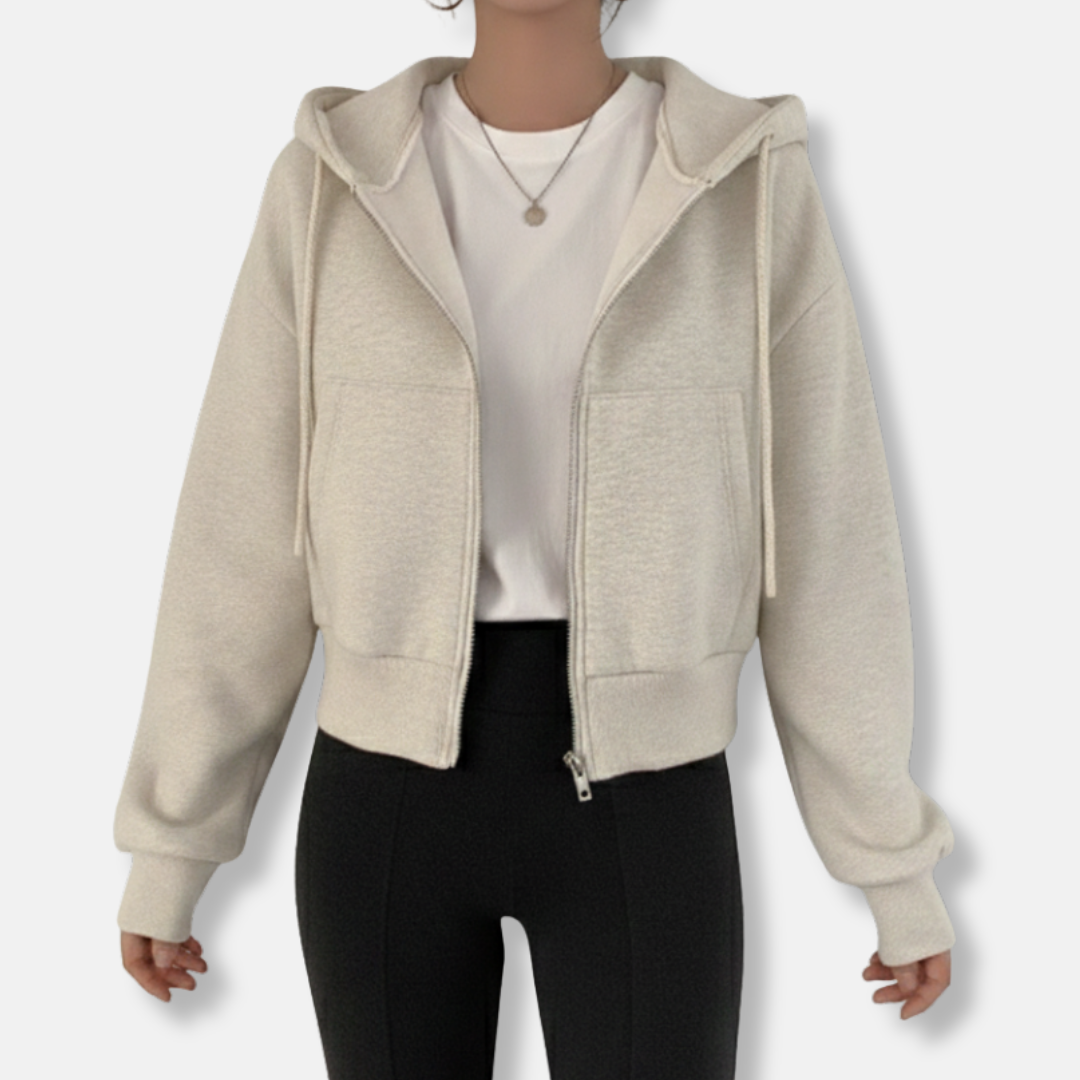 Women's oversized zip-up hoodie in neutral tone, fleece-lined with kangaroo pocket for cozy everyday style