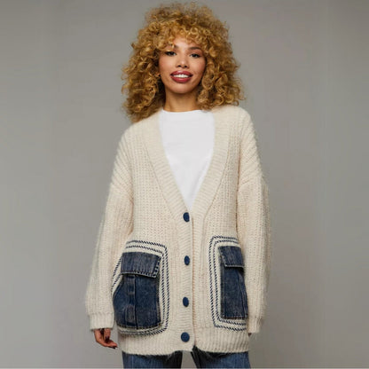 Oversized brown thick-knit cardigan with rugged denim pocket accents for urban style