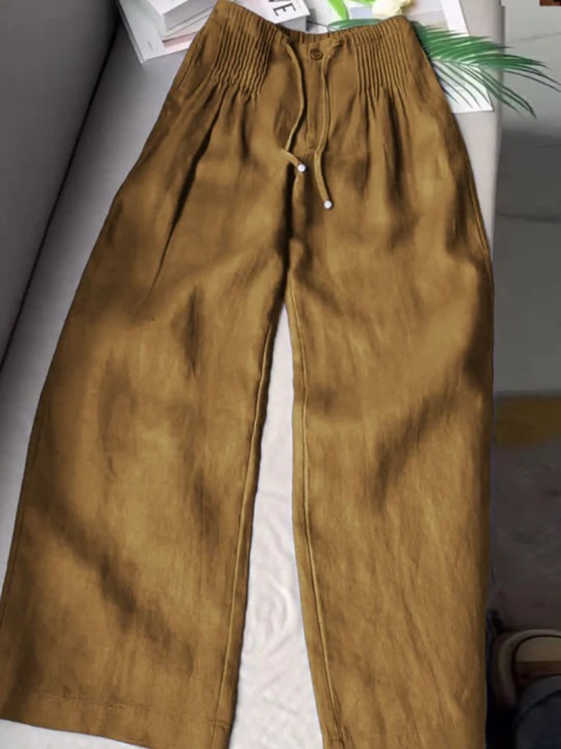 Black wide-leg pants with relaxed fit and flattering silhouette for effortless everyday elegance