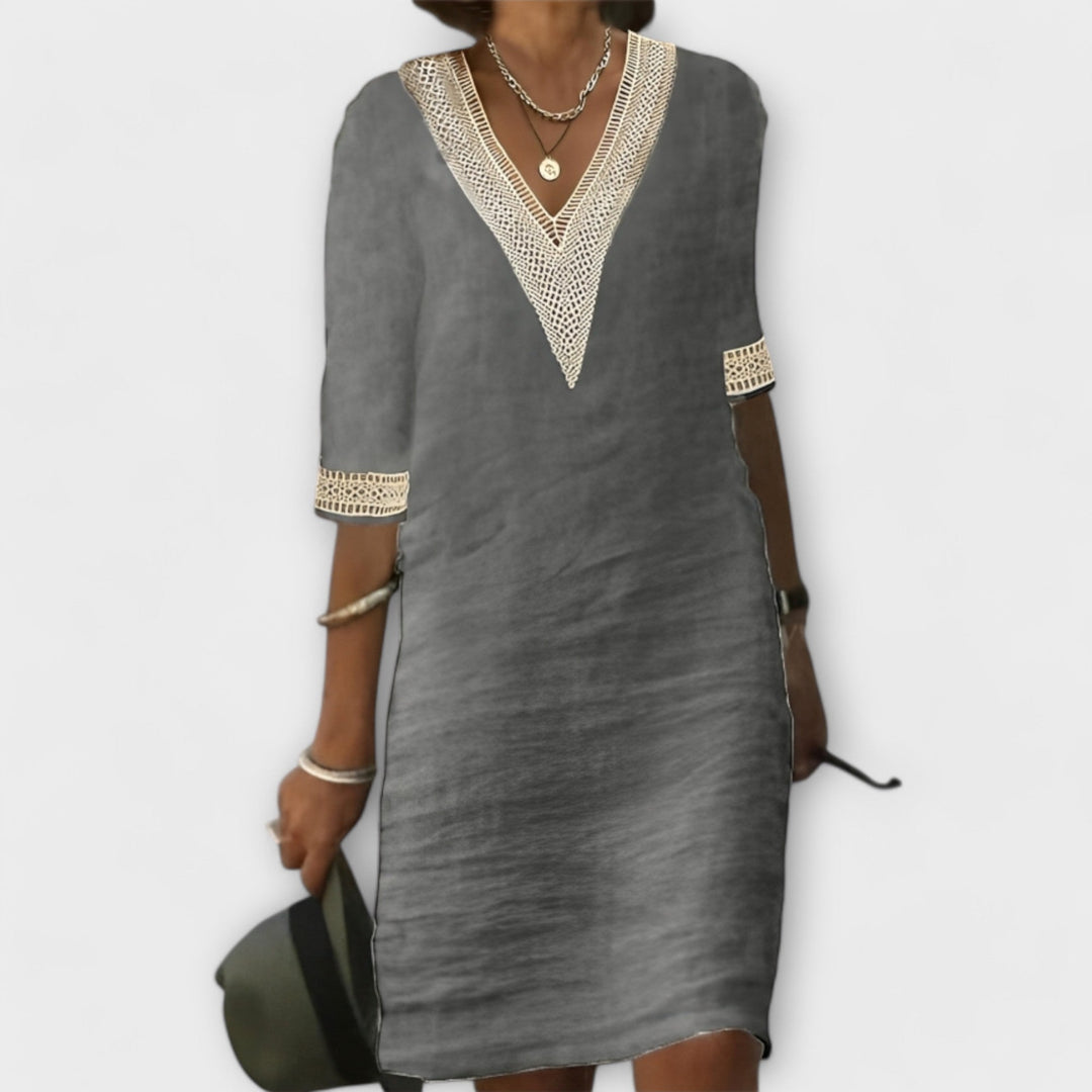Ivory boho crochet maxi dress with intricate lace detailing, airy relaxed fit and flowing silhouette