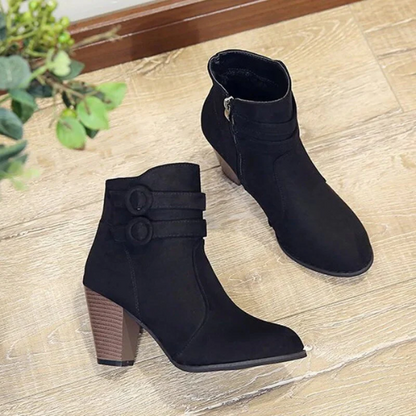 Women's red suede ankle boots with side zip and double buckle detail, chic semi-formal style