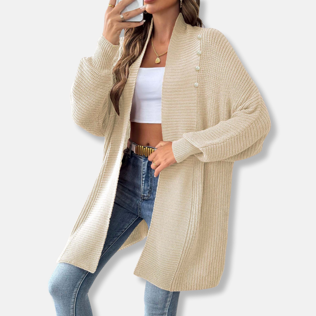 Women's longline acrylic knit cardigan with shawl collar and elegant pearl button closure
