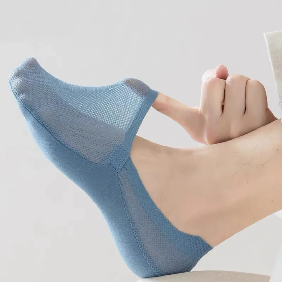 White low-cut invisible socks with breathable weave and anti-slip grip sole for all-day comfort