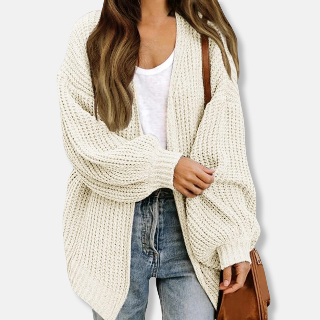 Women's oversized knit cardigan with lantern sleeves and ribbed cuffs for a relaxed refined silhouette