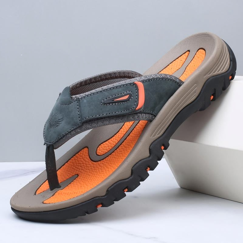 Brown leather sandals with structured straps and cushioned shock-absorbing sole for all-day comfort