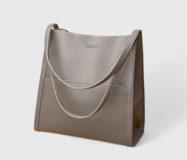Thora minimalist shoulder bag in neutral tone, sleek structured silhouette with clean lines