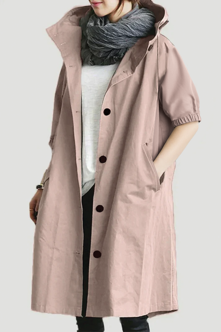 Beige hooded trench coat with belted waist and classic double-breasted front closure