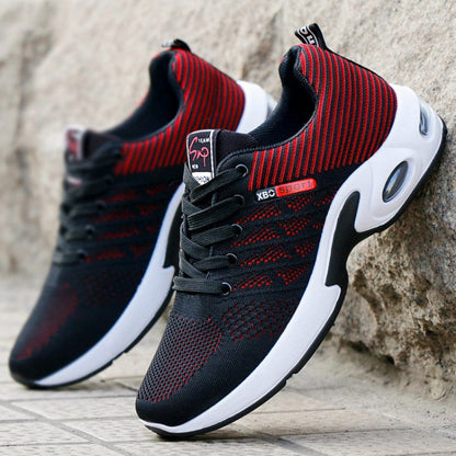 White comfort sneakers with breathable mesh upper and cushioned sole for all-day support