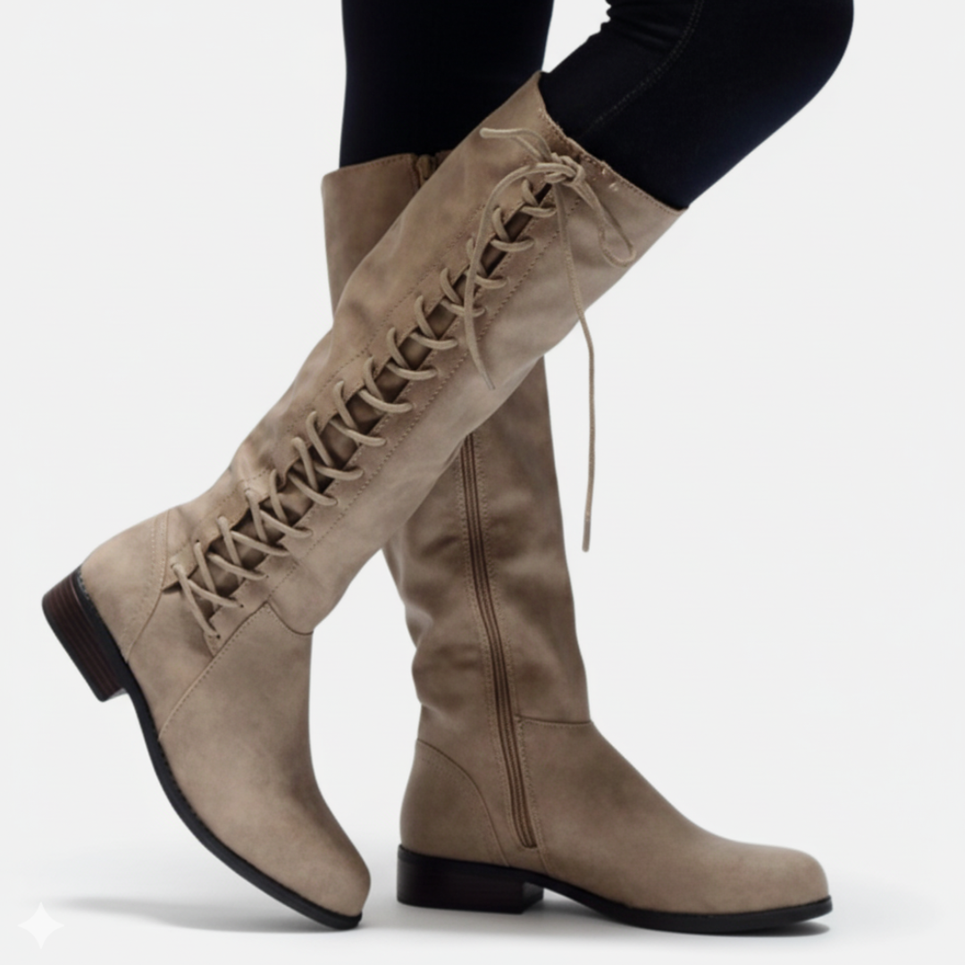 Black faux leather knee-high boots with criss-cross lacing, block heel, and side zipper