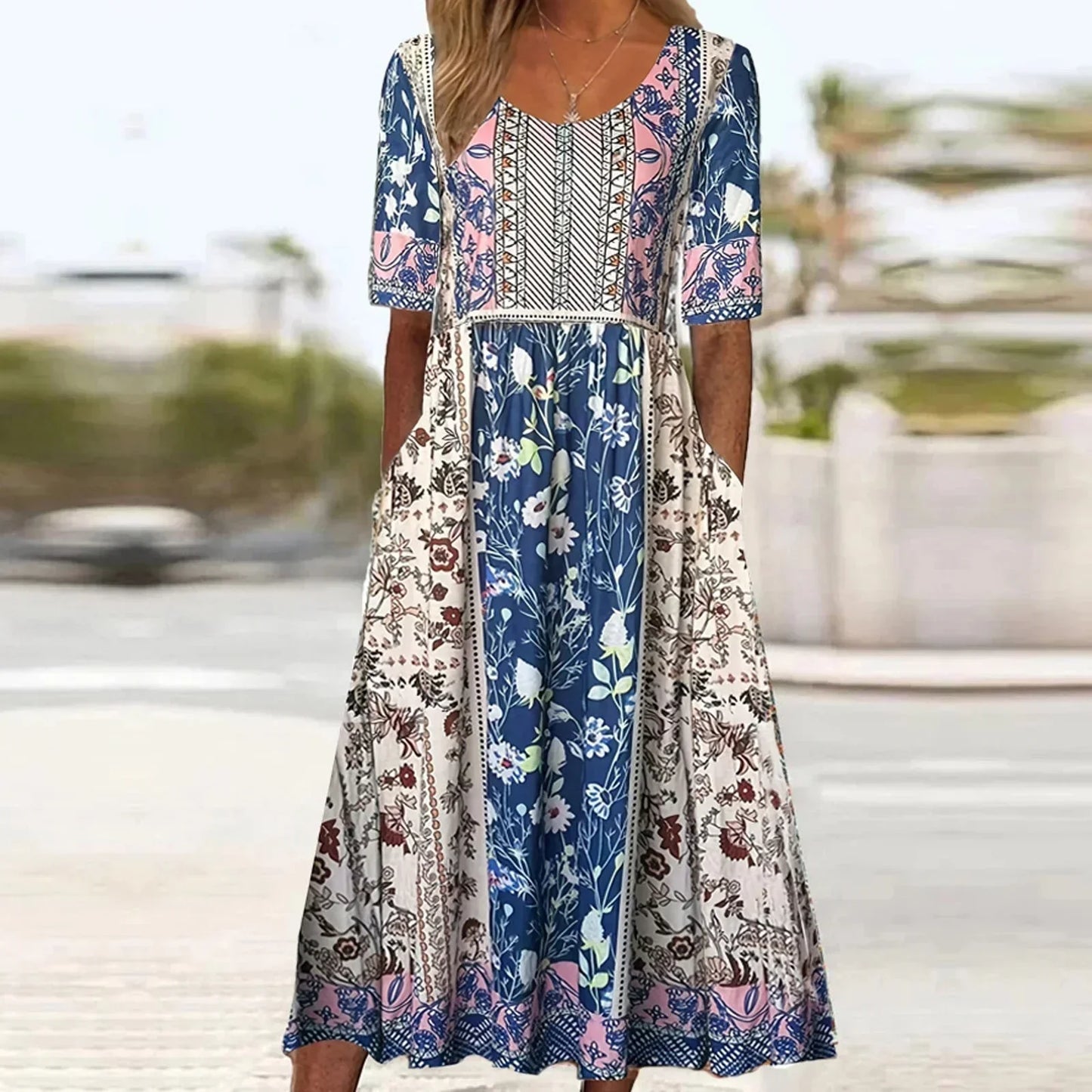 Boho print midi dress with round neckline, flowing relaxed fit in artistic multicolor pattern