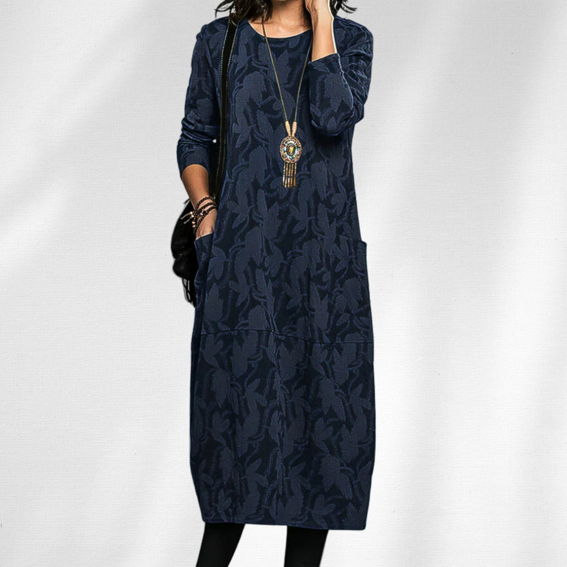 Elegant black crewneck winter dress with cozy premium knit fabric and flattering slim-fit silhouette