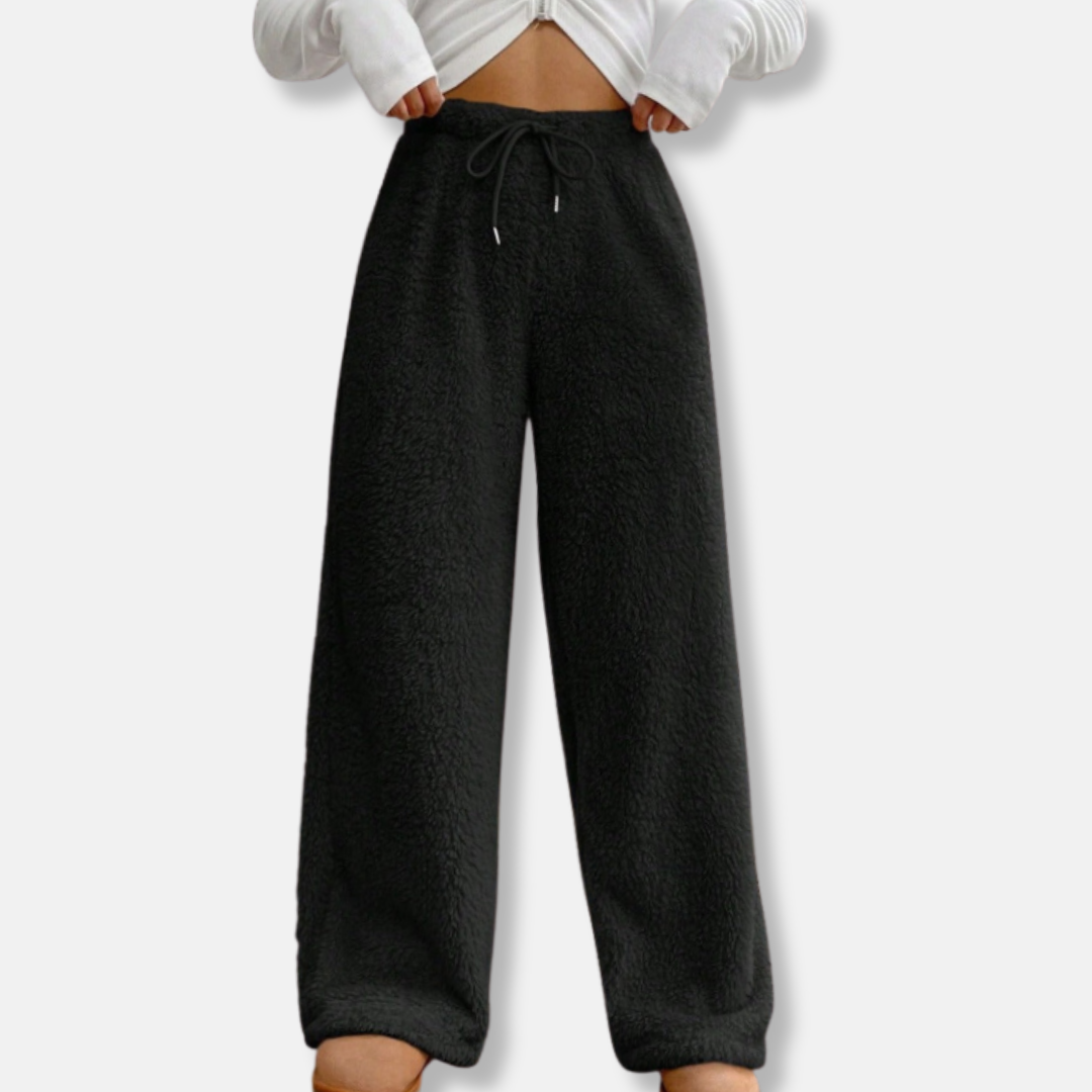 Women's plush fleece lounge pants in wide-leg loose fit with adjustable drawstring waist