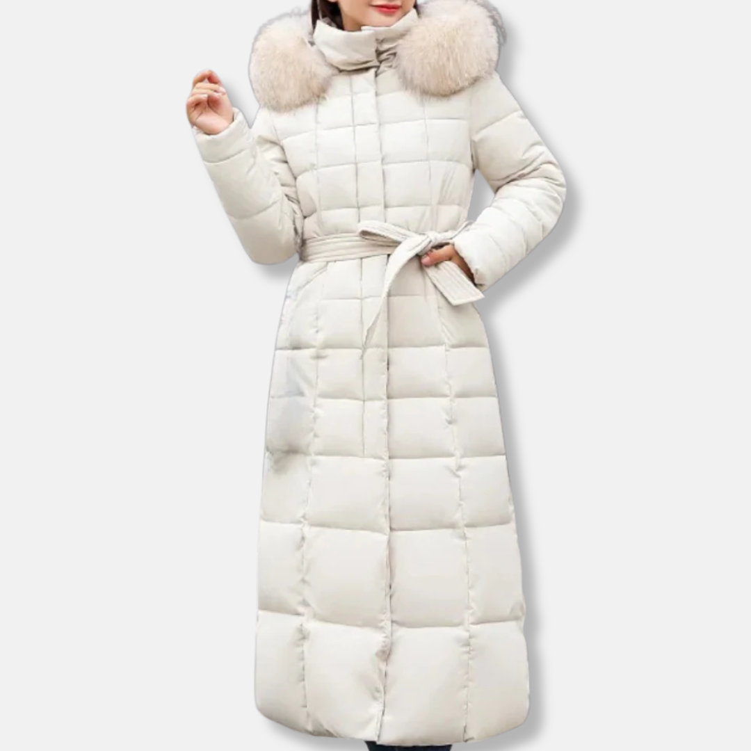 Women's long slim-fit quilted coat with belted waist and fur-trimmed hood, insulated winter style