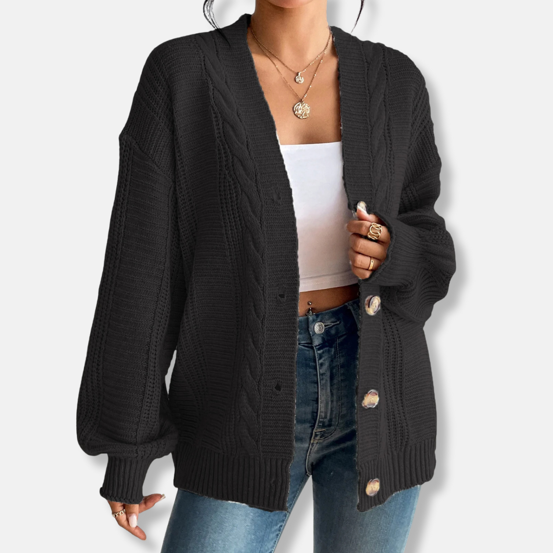 Women's oversized wool blend cable knit cardigan in neutral tones, button front cozy fall essential