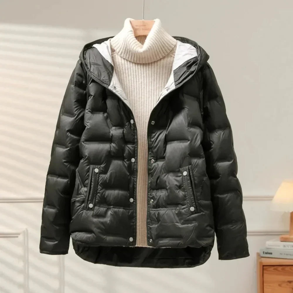 Women's quilted puffer coat in neutral tone, warm insulated down fill, cozy chic winter silhouette