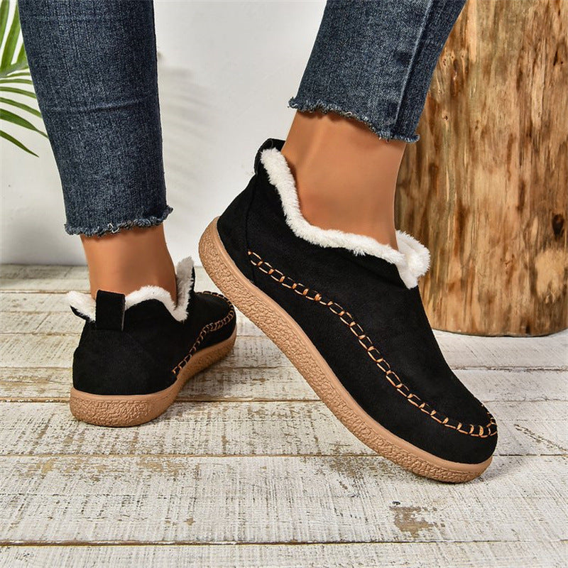 Women's cozy slip-on moccasin winter boots in warm tones with plush lining and timeless casual style