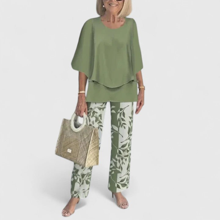 Sage green floral print two-piece set with relaxed layered top and wide-leg pants for women