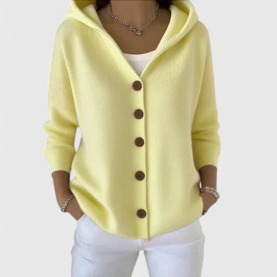 Elegant cream knit cardigan with flattering drape and refined lightweight layering design