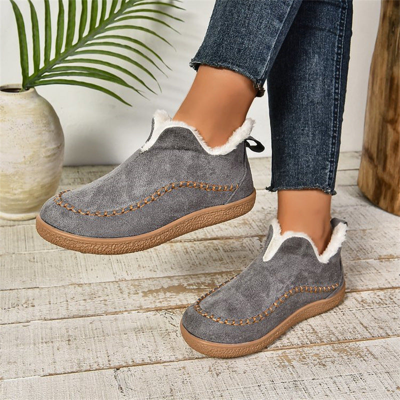 Women's cozy slip-on moccasin winter boots with plush lining, warm beige tones, casual flat style