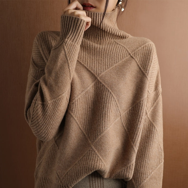 Cream diamond knit turtleneck sweater with ribbed neckline and textured cozy silhouette
