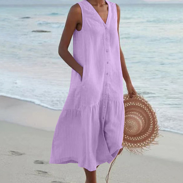 Sleeveless buttoned midi dress with slimming silhouette and chic front button detail for effortless style