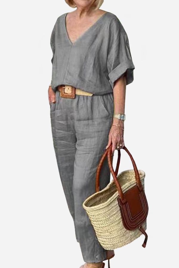 Women's red batwing V-neck top and straight-leg pants matching set with tailored silhouette