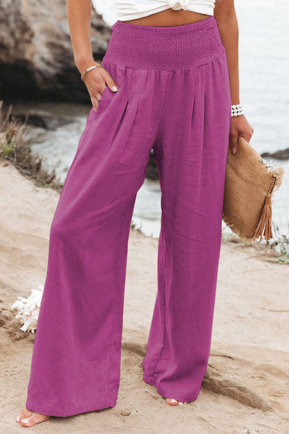 Women's wide leg vacation trousers in breezy flowing fabric, high-waist silhouette for effortless summer style