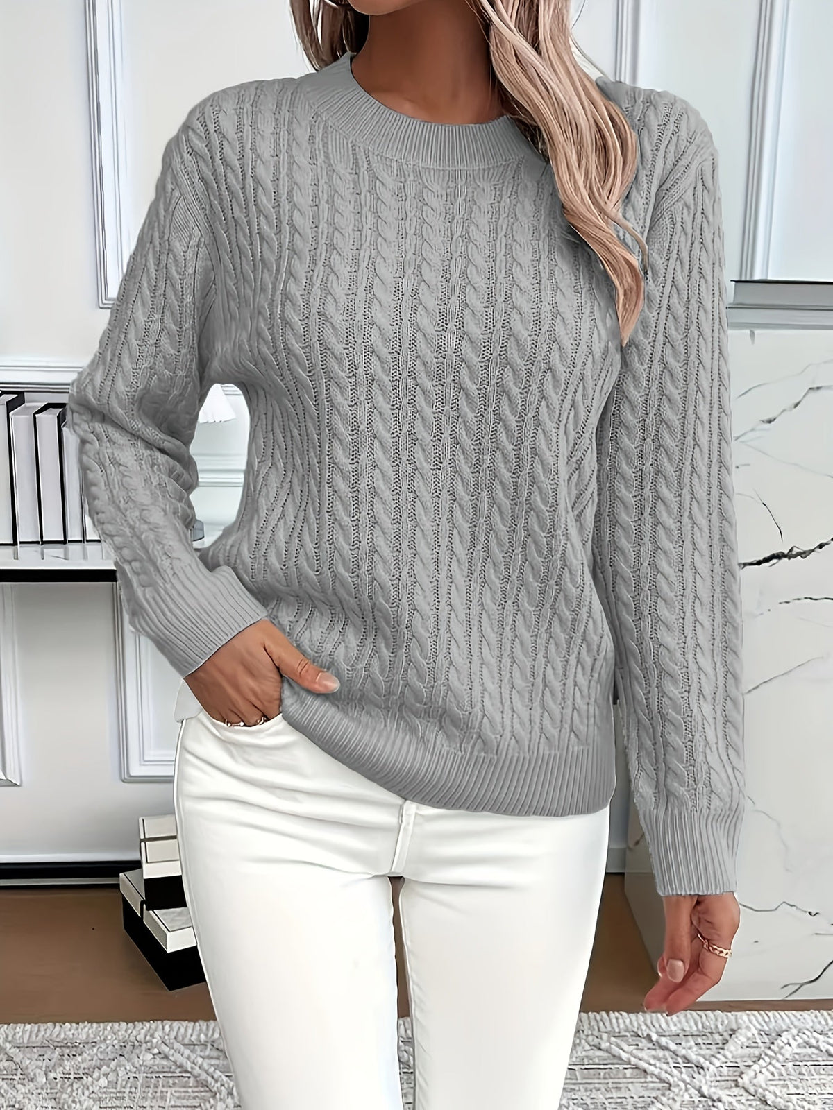 Women's cream cable knit jumper relaxed fit with intricate textured pattern for cozy everyday wear