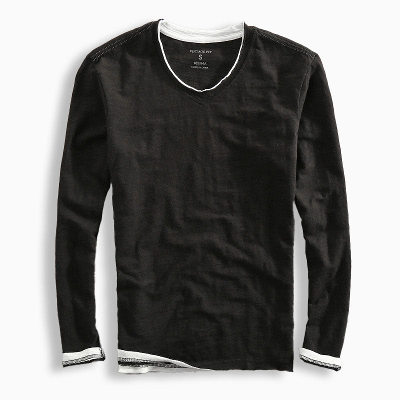 Men's navy slim fit long sleeve V-neck tee with contrast trim and subtle slub texture