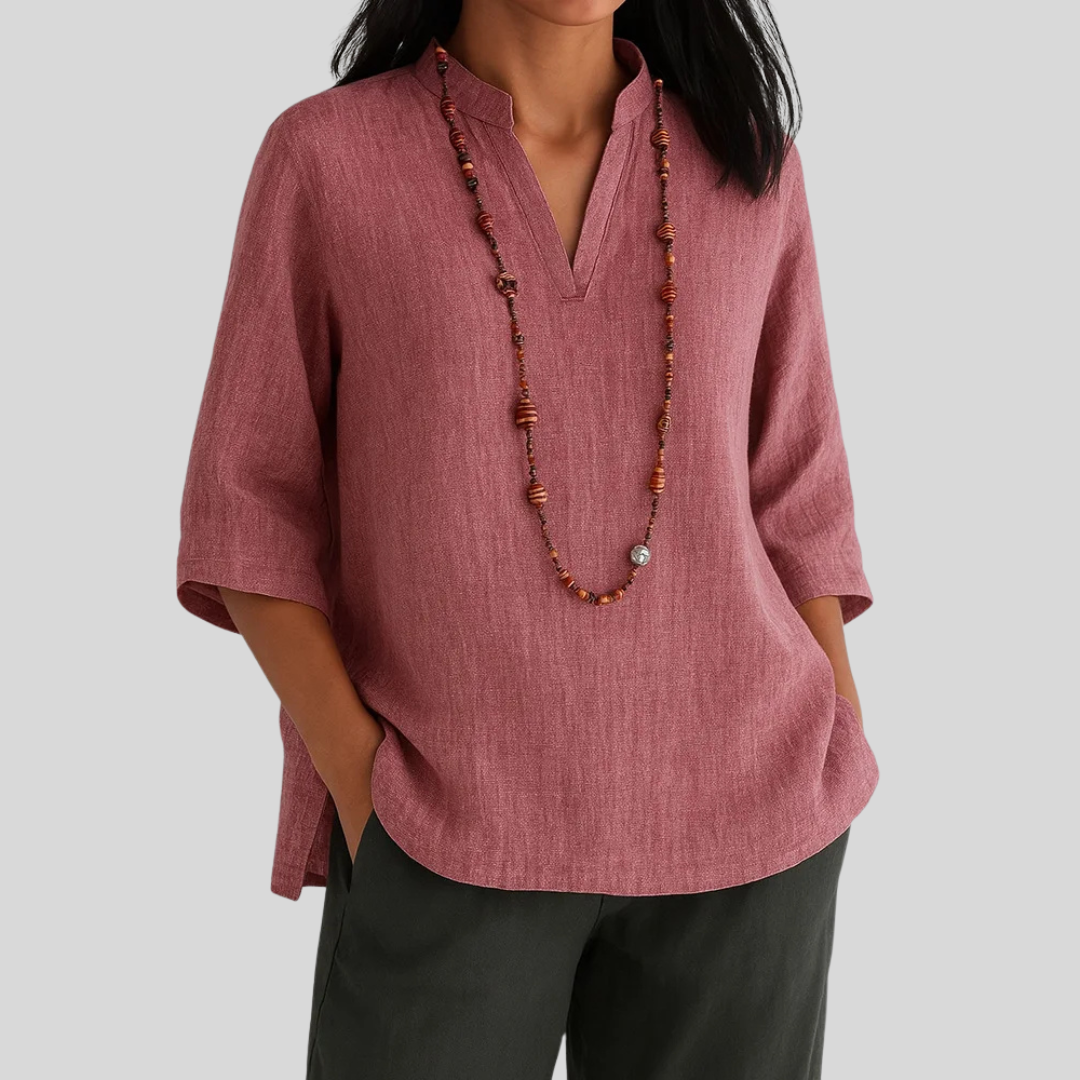 Soft green relaxed-fit blouse with airy drape and effortless elegant style for warm weather