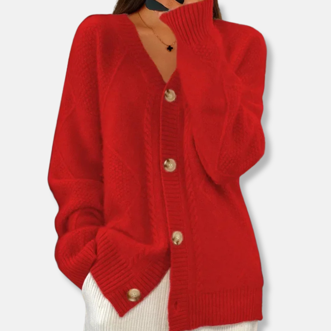 Women's cream cable knit relaxed fit cardigan with V-neck and button front closure