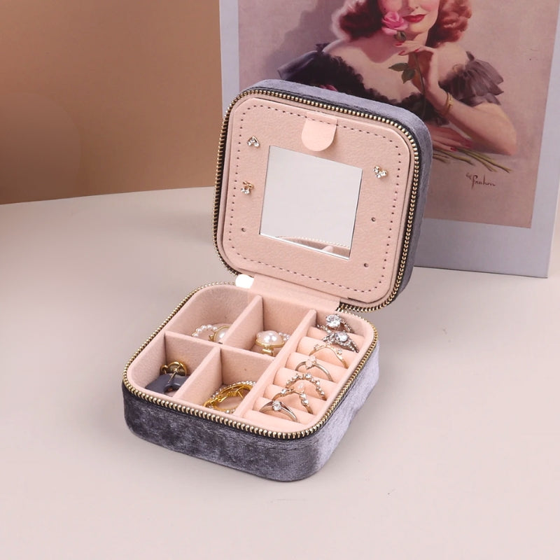 Rivelle velvet-lined jewelry box, compact travel-friendly case with secure zipper closure