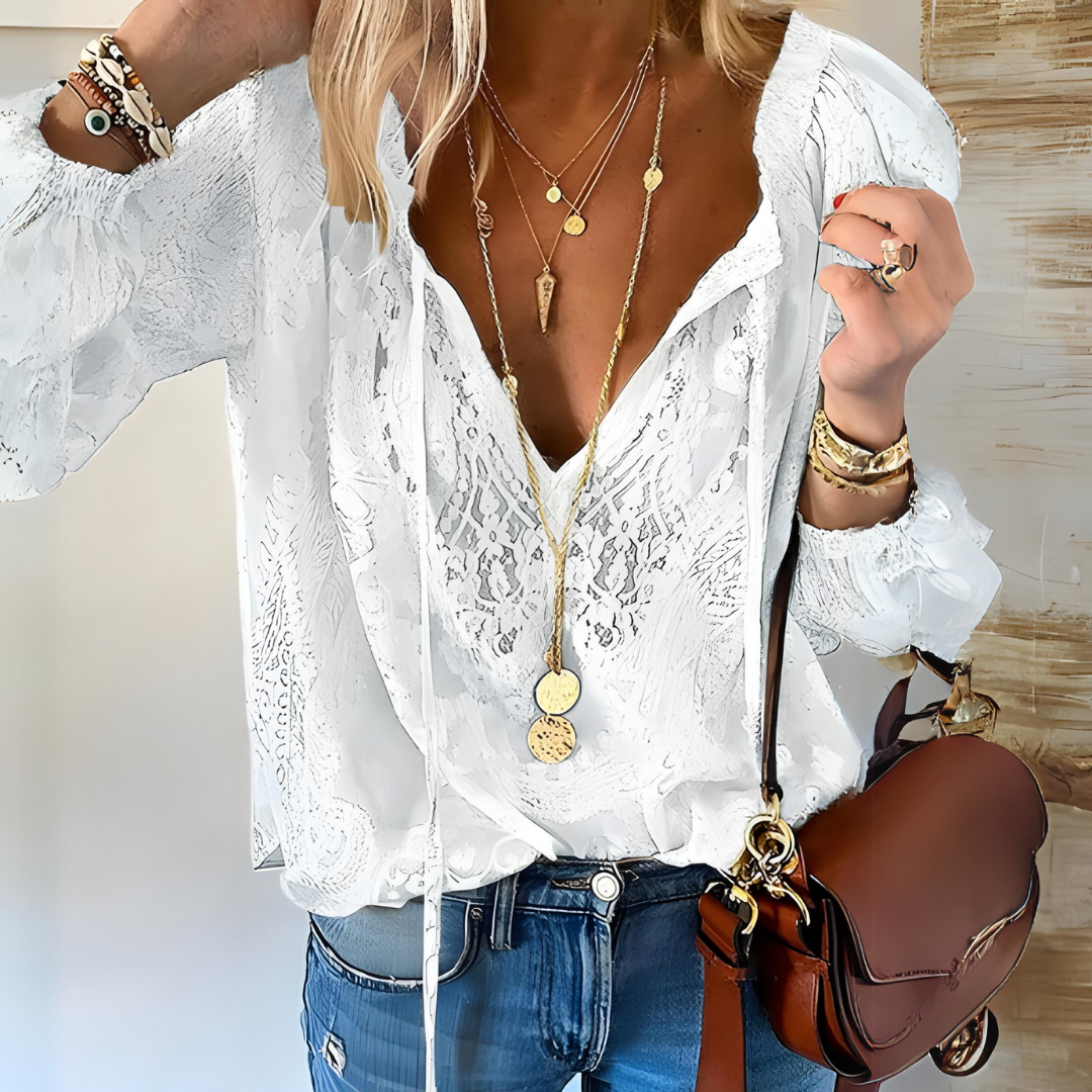 Ivory sheer lace blouse with tie-front neckline, airy sleeves, and lightweight layering silhouette
