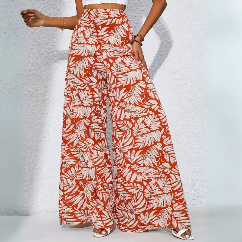 Tropical print high-waist cotton trousers with roomy side pockets for a relaxed breezy fit