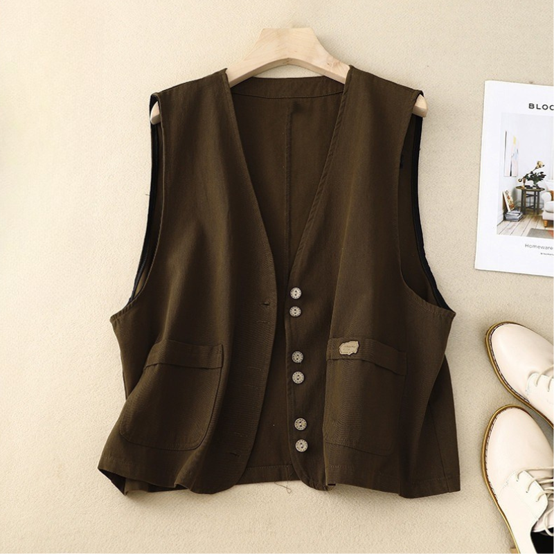 Relaxed button-front vest in neutral tones with soft drape, patch pockets and natural buttons