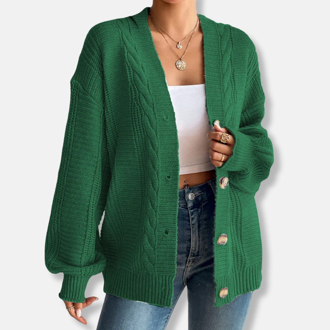 Women's oversized wool blend cable knit cardigan in neutral tone with button front cozy fall style