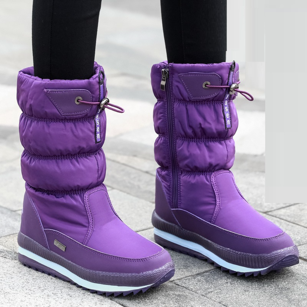 Women's black winter insulated zipper boots with sleek ankle design and durable side zipper closure